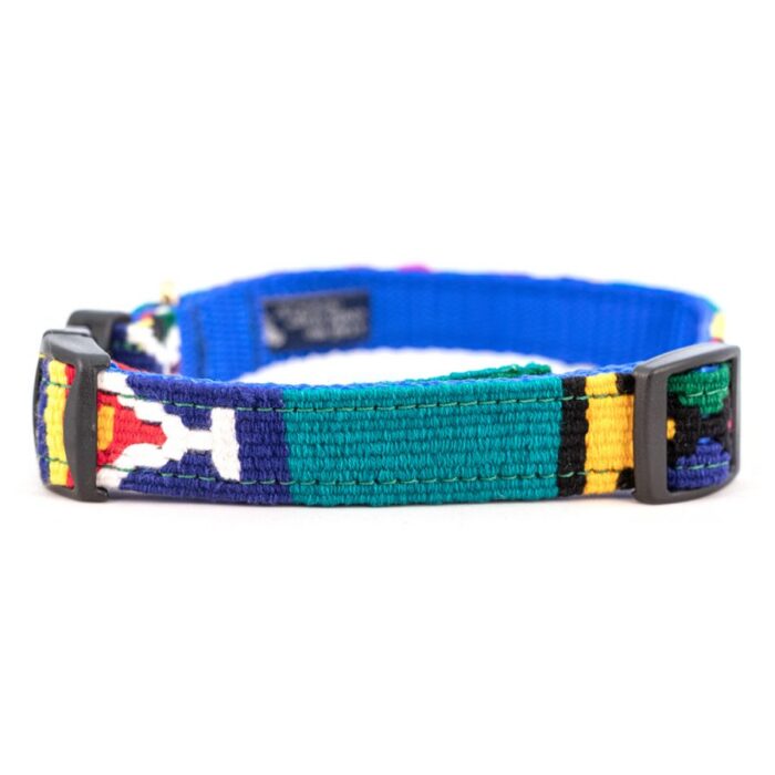 Moab Juniper side release dog collar with green background and colorful traditional patterns