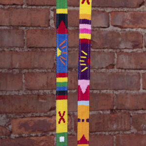 a tail we could wag Harborside leash patterns in front of brick background