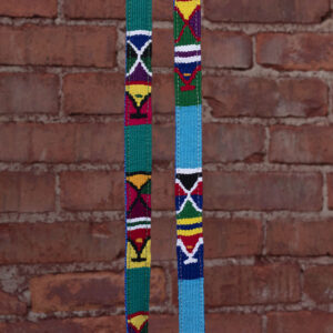 two a tail we could wag leash Moab colorways in front of brick background