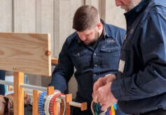 Chris and Al setting up the product display